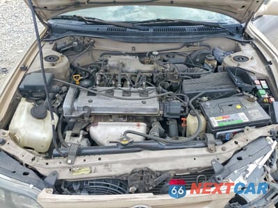 Zdjęcie 11 z 12 samochodu: 1997 TOYOTA COROLLA DX VIN:1NXBB02E6VZ514202 - miniatura
