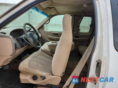 Zdjęcie 7 z 12 samochodu: 1999 FORD F150 VIN:1FTRX17W9XKB78409 - miniatura