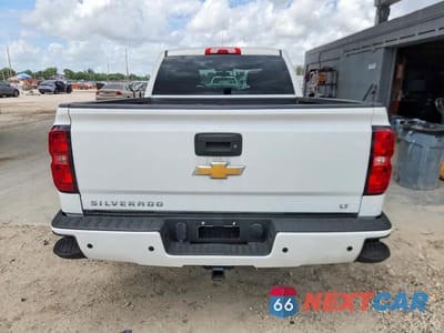 Zdjęcie 6 z 12 samochodu: 2017 CHEVROLET SILVERADO K1500 LT VIN:3GCUKREC0HG241177 - miniatura