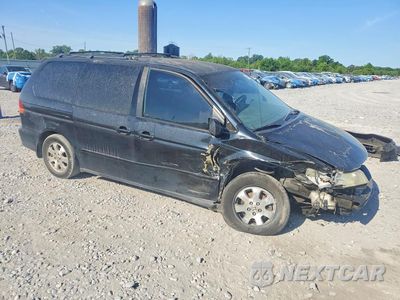 Czwarte zdjęcie samochodu z boku: 2003 HONDA ODYSSEY EXL VIN:5FNRL18903B120698 - miniatura
