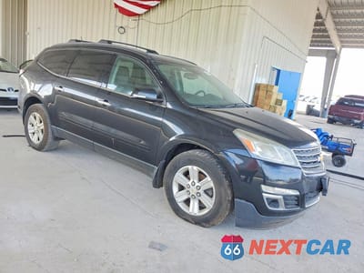 Czwarte zdjęcie samochodu z boku: 2014 CHEVROLET TRAVERSE LT VIN:1GNKVHKD3EJ107688 - miniatura