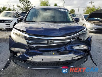 Piąte zdjęcie samochodu w środku: 2016 HONDA PILOT TOURING VIN:5FNYF5H94GB008454 - miniatura