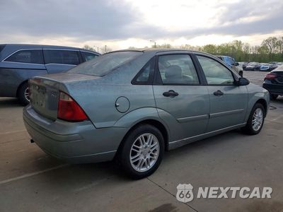 Trzecie zdjęcie samochodu z tyłu: 2005 FORD FOCUS VIN:1FAFP34N95W249436 - miniatura