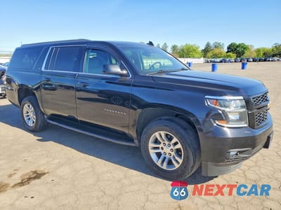 Czwarte zdjęcie samochodu z boku: 2019 CHEVROLET SUBURBAN K1500 LT VIN:1GNSKHKC5KR155576 - miniatura