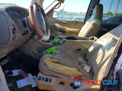 Zdjęcie 7 z 13 samochodu: 2000 FORD EXPEDITION EDDIE BAUER VIN:1FMEU17L9YLB14035 - miniatura