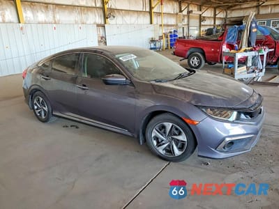 Czwarte zdjęcie samochodu z boku: 2019 HONDA CIVIC LX VIN:19XFC2F6XKE051301 - miniatura