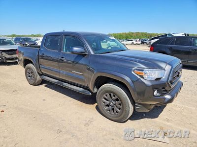 Czwarte zdjęcie samochodu z boku: 2023 TOYOTA TACOMA SR5 V6 VIN:3TMCZ5AN8PM582110 - miniatura
