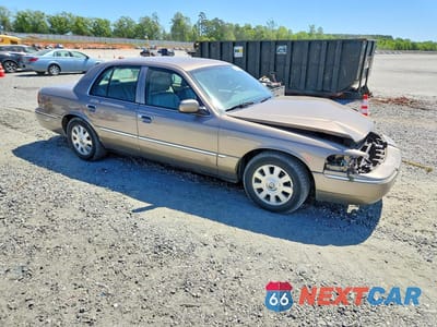 Czwarte zdjęcie samochodu z boku: 2003 MERCURY GRAND MARQUIS LS VIN:2MEFM75WX3X669997 - miniatura