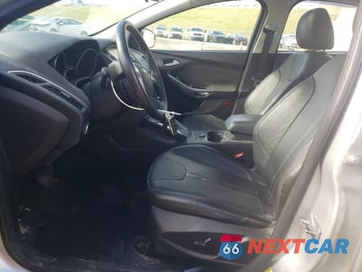 Zdjęcie 7 z 11 samochodu: 2014 FORD FOCUS TITANIUM VIN:1FADP3J23EL128579 - miniatura
