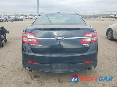 Zdjęcie 6 z 12 samochodu: 2014 FORD TAURUS SEL VIN:1FAHP2H87EG161227 - miniatura