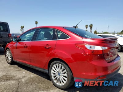 Drugie zdjęcie samochodu z przodu: 2012 FORD FOCUS TITANIUM VIN:1FAHP3J22CL429441 - miniatura