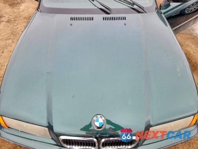 Zdjęcie 11 z 12 samochodu: 1999 BMW 328 IC VIN:WBABK7335XET67567 - miniatura