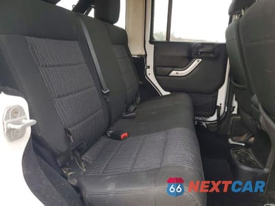Zdjęcie 10 z 12 samochodu: 2012 JEEP WRANGLER UNLIMITED SAHARA VIN:1C4BJWEG3CL277680 - miniatura