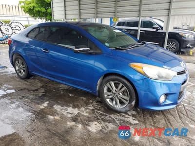 Czwarte zdjęcie samochodu z boku: 2014 KIA FORTE KOUP SX VIN:KNAFZ6A32E5248091 - miniatura