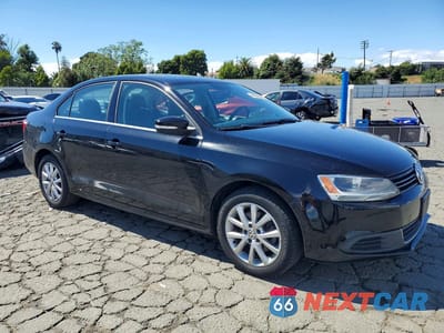 Czwarte zdjęcie samochodu z boku: 2013 VOLKSWAGEN JETTA SE VIN:3VWDP7AJ2DM287970 - miniatura