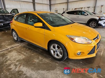 Czwarte zdjęcie samochodu z boku: 2012 FORD FOCUS SE VIN:1FAHP3K23CL284747 - miniatura