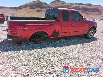 Trzecie zdjęcie samochodu z tyłu: 1999 FORD F150 VIN:1FTRX08L8XKA43288 - miniatura
