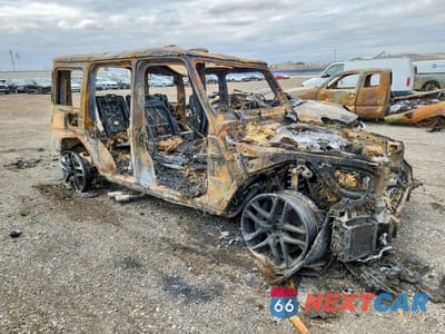 Czwarte zdjęcie samochodu z boku: 2022 MERCEDES-BENZ G 63 AMG VIN:W1NYC7HJ7NX446377 - miniatura