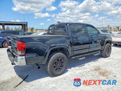 Trzecie zdjęcie samochodu z tyłu: 2020 TOYOTA TACOMA SR5 V6 VIN:3TMAZ5CN4LM136342 - miniatura