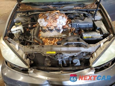 Zdjęcie 11 z 12 samochodu: 2003 TOYOTA CAMRY LE V6 VIN:4T1BF32K13U552171 - miniatura