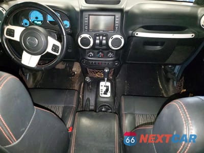 Zdjęcie 8 z 13 samochodu: 2012 JEEP WRANGLER SAHARA VIN:1C4AJWBG5CL174390 - miniatura