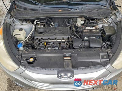 Zdjęcie 12 z 13 samochodu: 2011 HYUNDAI TUCSON GLS VIN:KM8JU3AC9BU263145 - miniatura