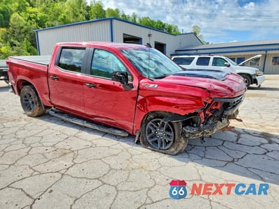 Czwarte zdjęcie samochodu z boku: 2023 CHEVROLET SILVERADO K1500 LT TRAIL BOSS VIN:3GCUDFED9PG263047 - miniatura