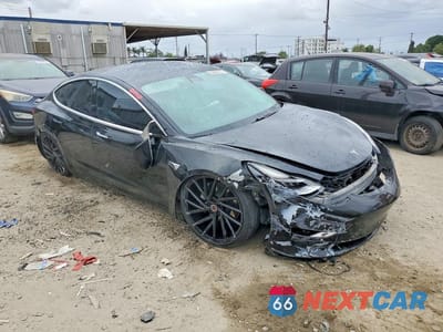 Czwarte zdjęcie samochodu z boku: 2020 TESLA MODEL 3 VIN:5YJ3E1EA5LF739148 - miniatura