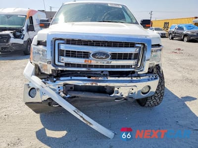 Piąte zdjęcie samochodu w środku: 2013 FORD F150 SUPERCREW VIN:1FTFW1EF6DKD54675 - miniatura