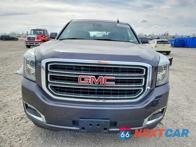 Piąte zdjęcie samochodu w środku: 2018 GMC YUKON SLT VIN:1GKS2BKCXJR277083 - miniatura