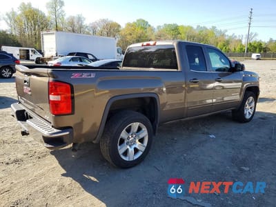 Trzecie zdjęcie samochodu z tyłu: 2015 GMC SIERRA K1500 SLE VIN:1GTV2UEC1FZ172522 - miniatura