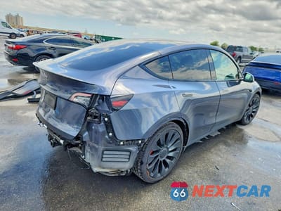 Trzecie zdjęcie samochodu z tyłu: 2022 TESLA MODEL Y VIN:7SAYGDEF7NF515446 - miniatura