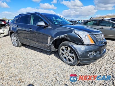 Czwarte zdjęcie samochodu z boku: 2010 CADILLAC SRX PREMIUM COLLECTION VIN:3GYFNKE45AS589750 - miniatura