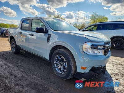 Czwarte zdjęcie samochodu z boku: 2024 FORD MAVERICK XLT VIN:3FTTW8H34RRA63558 - miniatura