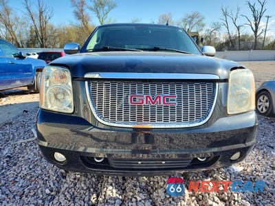 Piąte zdjęcie samochodu w środku: 2010 GMC YUKON SLT VIN:1GKUKCE03AR254521 - miniatura