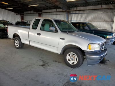 Czwarte zdjęcie samochodu z boku: 1999 FORD F150 VIN:1FTZX1729XNB93259 - miniatura