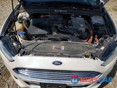 Zdjęcie 11 z 12 samochodu: 2014 FORD FUSION TITANIUM PHEV VIN:3FA6P0SU1ER356802 - miniatura