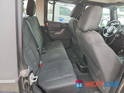 Zdjęcie 10 z 12 samochodu: 2016 JEEP WRANGLER UNLIMITED SPORT VIN:1C4BJWDG7GL103053 - miniatura