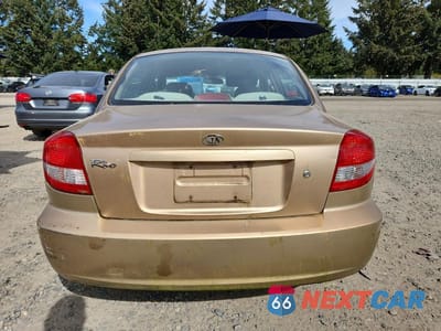 Zdjęcie 6 z 12 samochodu: 2003 KIA RIO BASE VIN:KNADC125636209300 - miniatura