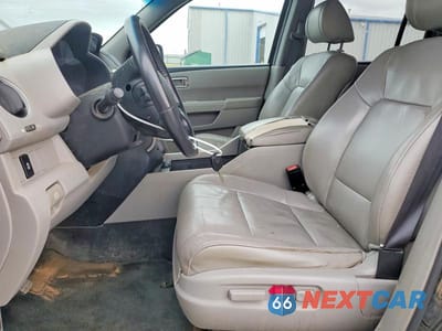 Zdjęcie 7 z 13 samochodu: 2015 HONDA PILOT EXL VIN:5FNYF4H5XFB029122 - miniatura