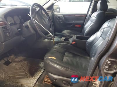 Zdjęcie 7 z 13 samochodu: 2002 JEEP GRAND CHEROKEE LIMITED VIN:1J4GW58N12C263779 - miniatura