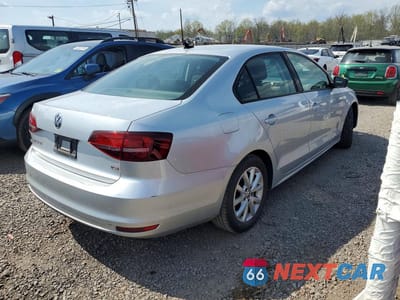 Trzecie zdjęcie samochodu z tyłu: 2016 VOLKSWAGEN JETTA SE VIN:3VWD67AJ3GM253639 - miniatura