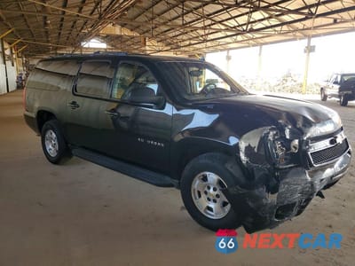 Czwarte zdjęcie samochodu z boku: 2011 CHEVROLET SUBURBAN C1500 LS VIN:1GNSCHE09BR123101 - miniatura