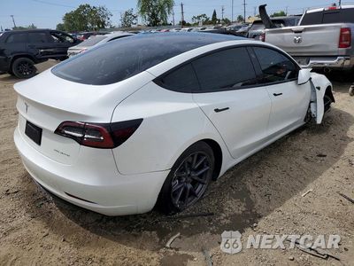 Trzecie zdjęcie samochodu z tyłu: 2022 TESLA MODEL 3 VIN:5YJ3E1EB9NF335765 - miniatura