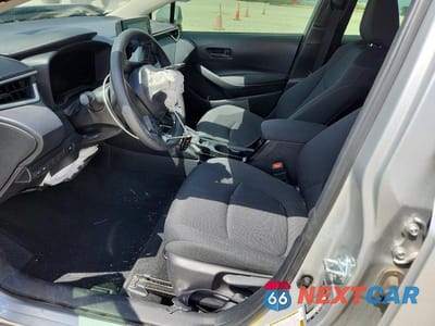 Zdjęcie 7 z 12 samochodu: 2022 TOYOTA COROLLA HYBRID LE VIN:JTDEAMDE4N3008625 - miniatura