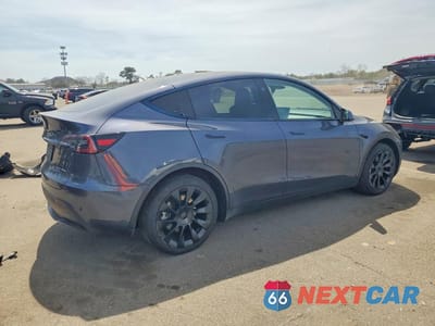 Trzecie zdjęcie samochodu z tyłu: 2023 TESLA MODEL Y VIN:7SAYGAEE2PF836805 - miniatura