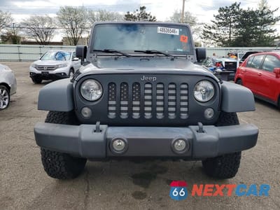Piąte zdjęcie samochodu w środku: 2017 JEEP WRANGLER SPORT VIN:1C4AJWAG5HL598810 - miniatura