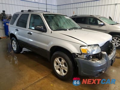 Czwarte zdjęcie samochodu z boku: 2006 FORD ESCAPE XLT VIN:1FMYU03146KA23656 - miniatura