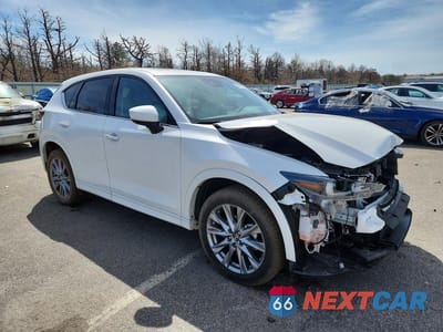 Czwarte zdjęcie samochodu z boku: 2024 MAZDA CX-5 PREMIUM VIN:JM3KFBDL7R0503858 - miniatura