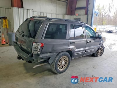 Trzecie zdjęcie samochodu z tyłu: 2002 JEEP GRAND CHEROKEE LIMITED VIN:1J4GW58N12C263779 - miniatura